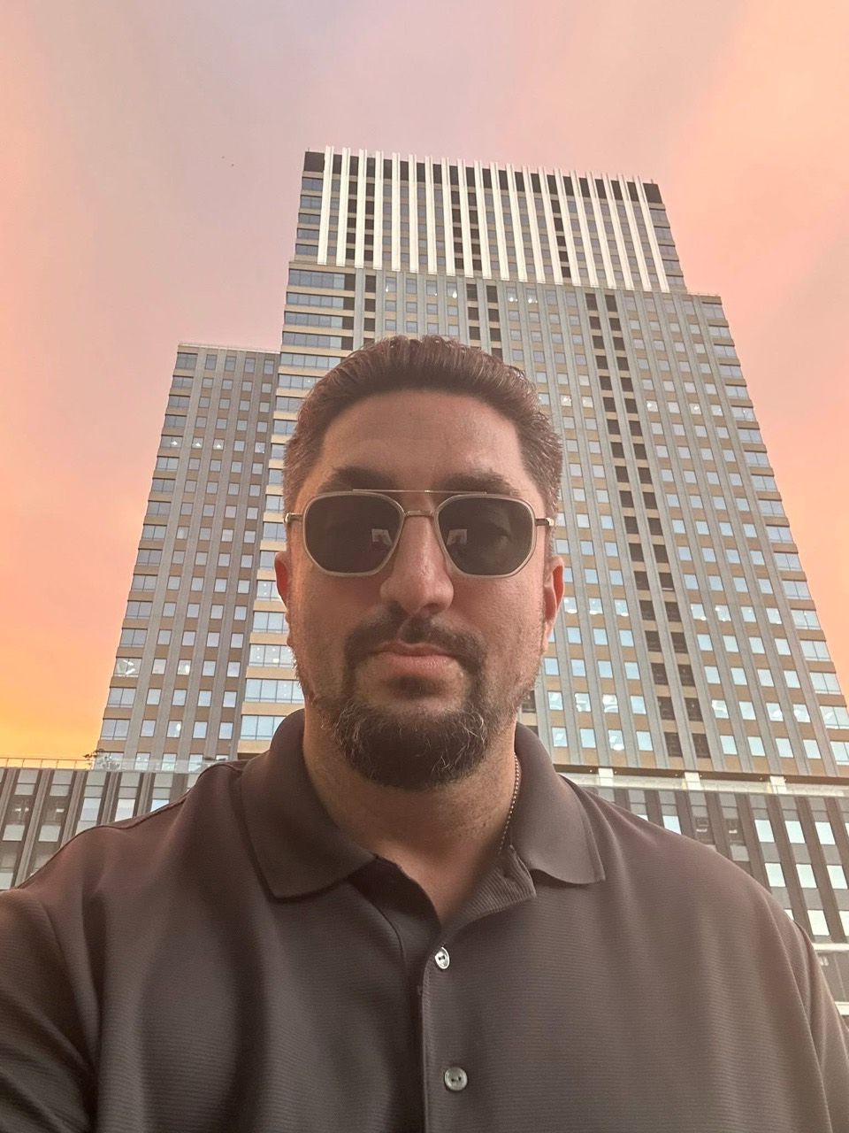 Benjamin in front of Cebu Exchange at sunset